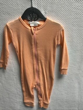 Firsts by Petit Lem. Soft Peach Ribbed Zip-Front Baby One-Piece . Organic cotton